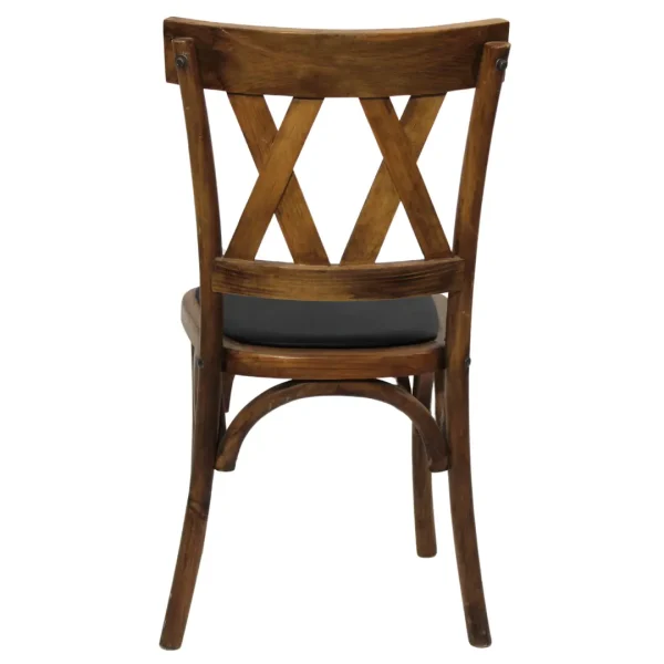 Silla Doble X de madera de pino con respaldo de doble cruceta y asiento tapizado, apilable.