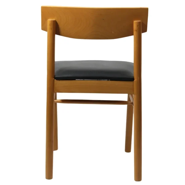 Silla Libia de madera de pino con asiento tapizado, no apilable.