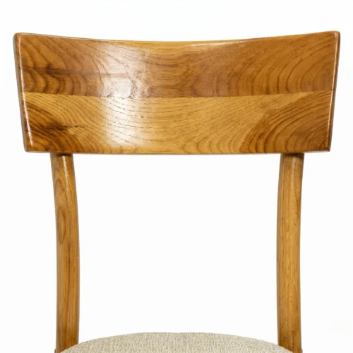 Silla Noback de madera de pino con asiento tapizado, apilable.